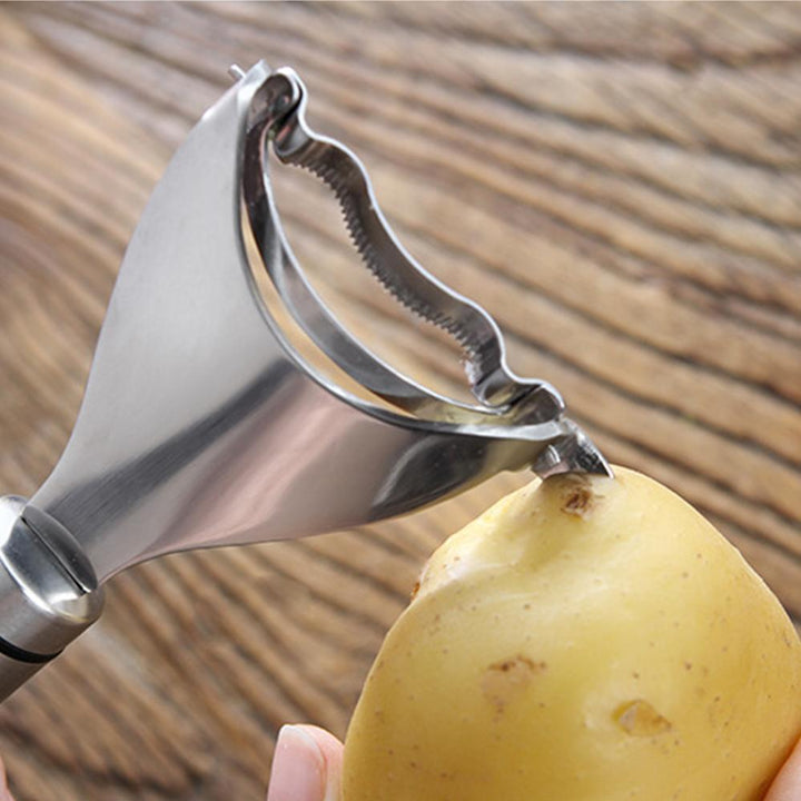 "Rostfri majskolvskalare med ergonomiskt handtag, silvrig, hållbar, effektiv för enkel majsberedning i köket."