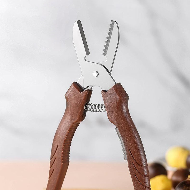 "Rostfri nötöppnare med brun detaljer, ergonomisk design för enkel öppning av valnötter och kastanjer i köket."