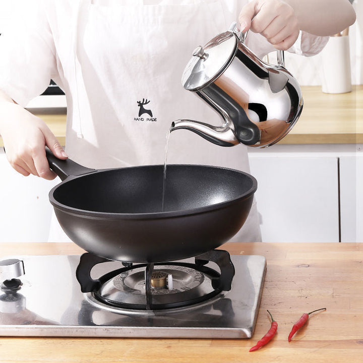 "Rostfri oljelektron i silver, multifunktionellt kökshjälpmedel med finmaskigt filter och ergonomiskt handtag."