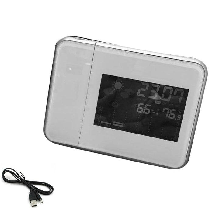 "Roterande klocka med färgdisplay, projicerar tid och temperatur i röd ton, elegant design för sovrum"