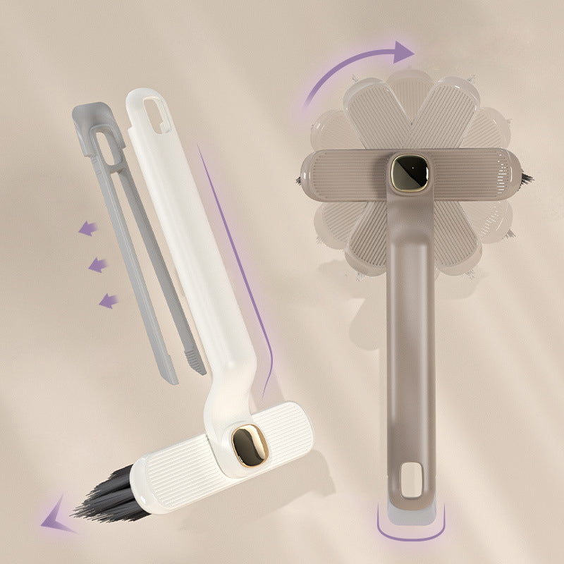 "Roterande multifunktionsborste i vit, grå och lila med ultrafina borsthår för effektiv rengöring av trånga utrymmen."