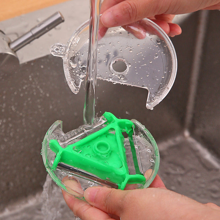 "Roterbar grönsaksskalare med 3 utbytbara blad, ergonomiskt handtag, rostfritt stål, för kök i färger röd, blå, grön."