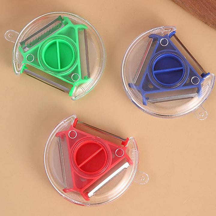 "Roterbar grönsaksskalare med 3 utbytbara blad, ergonomiskt handtag, rostfritt stål, för kök i färger röd, blå, grön."