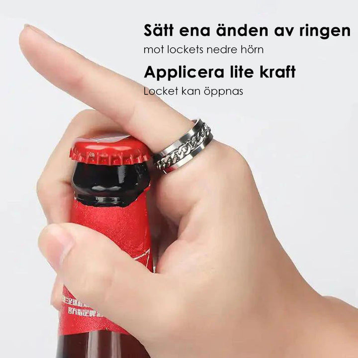 Roterbar unisex ring i titanstål, svart och stilren; elegant accessoar för modern och mångsidig stil.