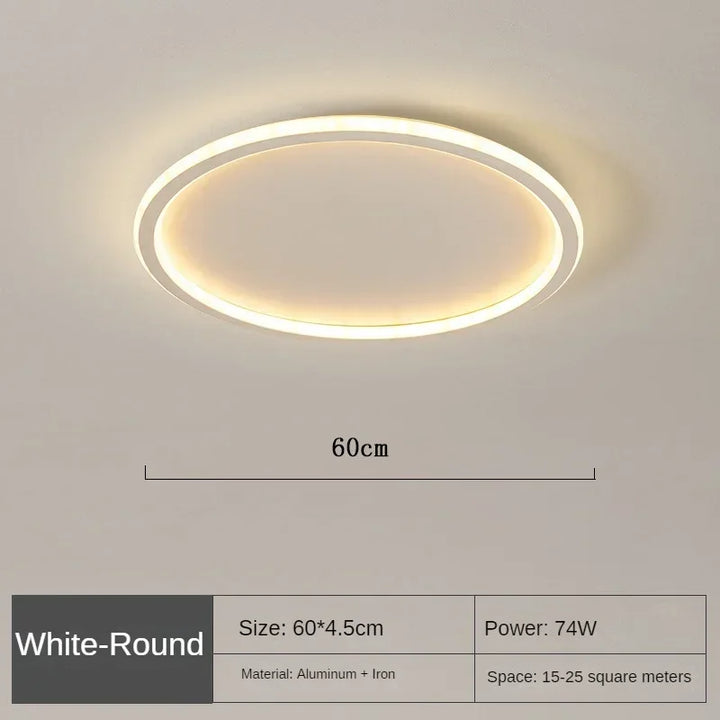 Elegant rund LED taklampa i guld och vitt, för samtida hem.