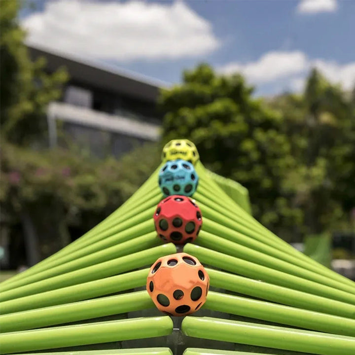 "Rund månsfoamleksak i färger blå, grön, gul, orange, rosröd, röd med studseffekt, perfekt för alla åldrar."