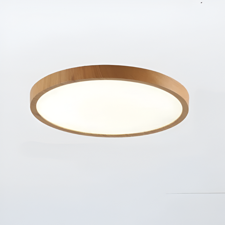 Rund LED taklampa i valnötsfinish med justerbar ljusfärg. Modern, energieffektiv inomhusbelysning.