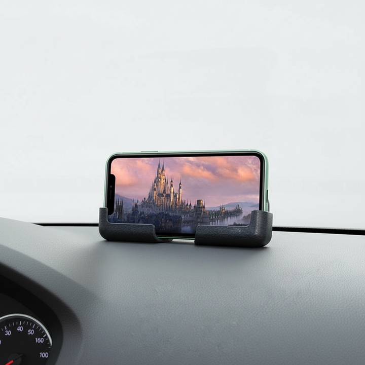 Universell mobilhållare AutoGrip för bilens instrumentbräda. Enkel montering & säker hållare för alla telefonmodeller.