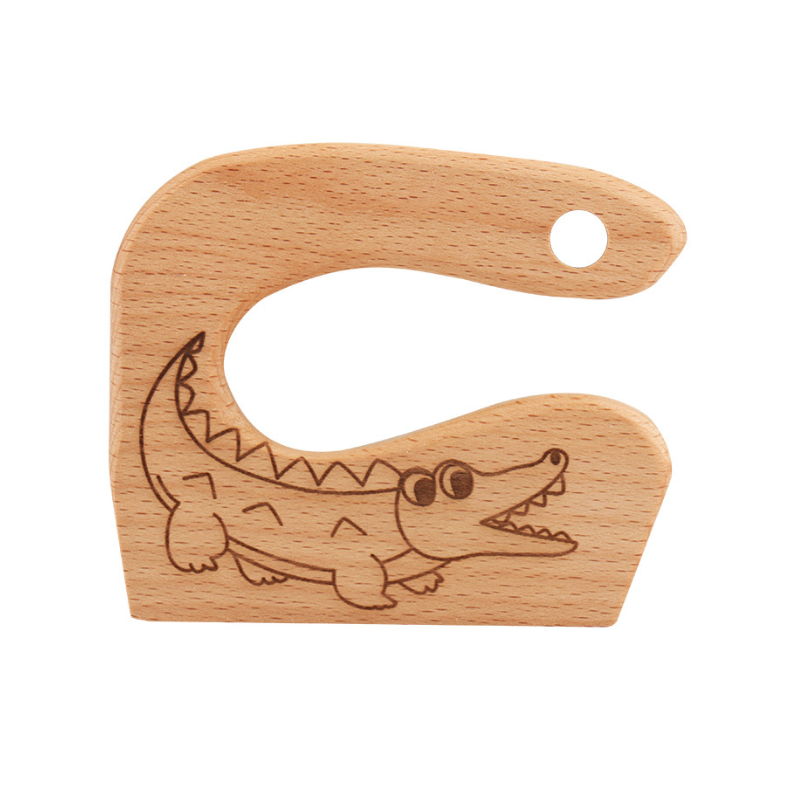 "Säker Montessori barnkniv i naturligt trä för barnköket, trubbig design och ergonomiskt grepp, perfekt för små händer."