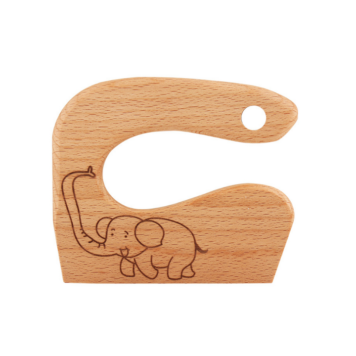 "Säker Montessori barnkniv i naturligt trä för barnköket, trubbig design och ergonomiskt grepp, perfekt för små händer."
