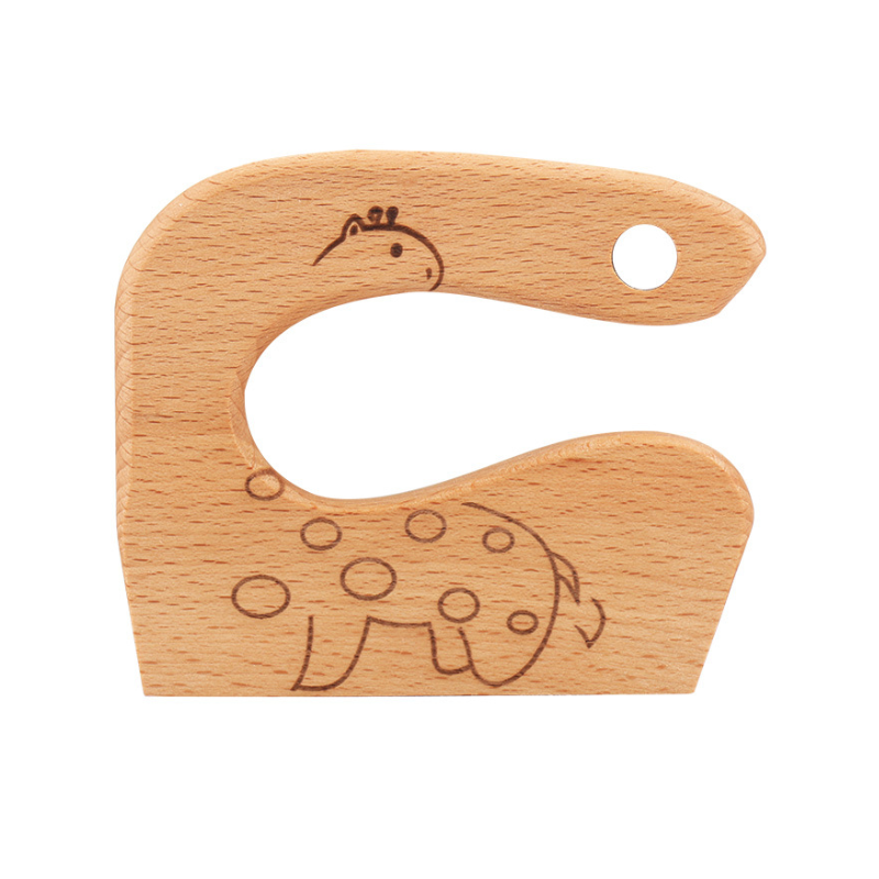 "Säker Montessori barnkniv i naturligt trä för barnköket, trubbig design och ergonomiskt grepp, perfekt för små händer."