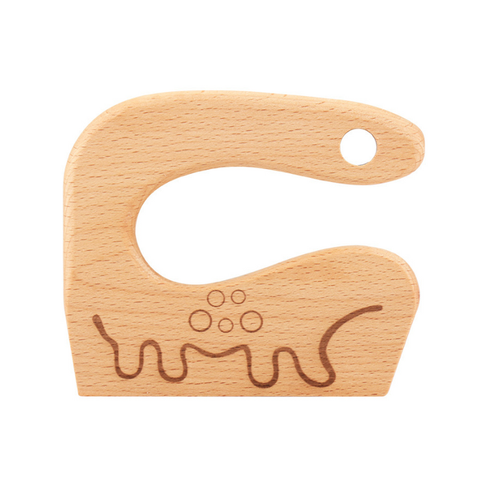 "Säker Montessori barnkniv i naturligt trä för barnköket, trubbig design och ergonomiskt grepp, perfekt för små händer."