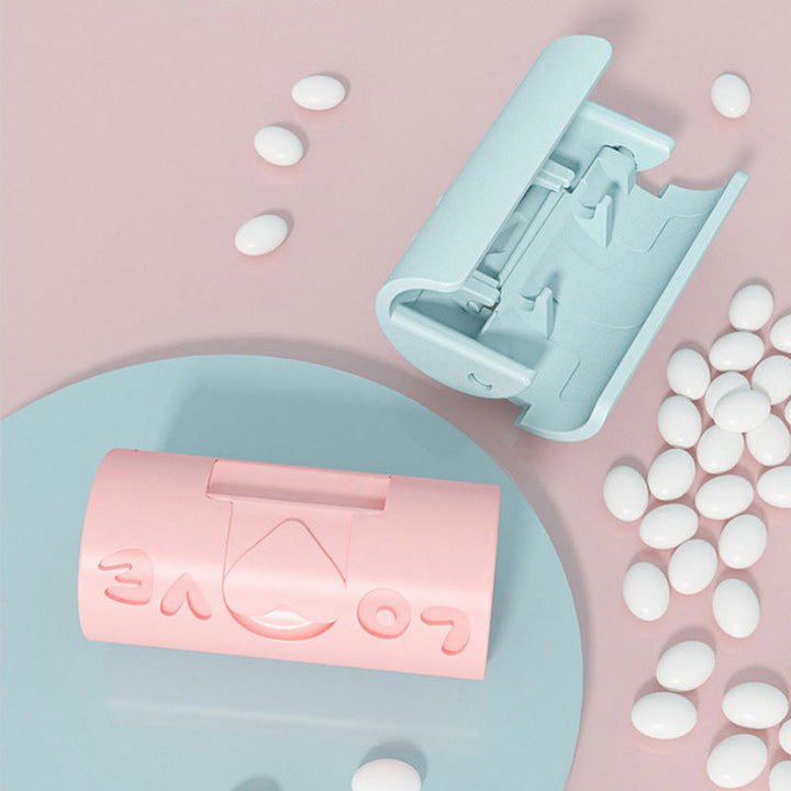 "Sänglakanhållare utan nålar i blå och rosa, funktionell och stilren, av slitstarkt ABS-material för prydligt sovrum."