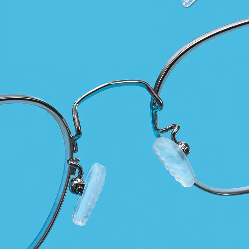 "Silikon näskyddsset: mjuka genomskinliga kuddar med plastfodral, idealisk för komfortabel glasögonanvändning."