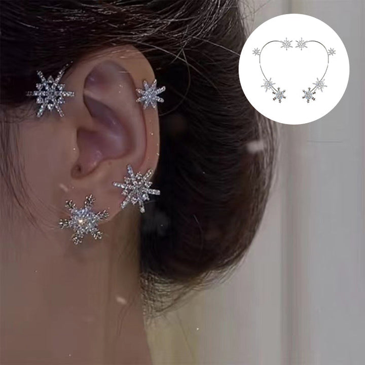 "Silver snöflinga örhängen utan piercing för damer, glänsande och stilren design, perfekt för alla tillfällen."