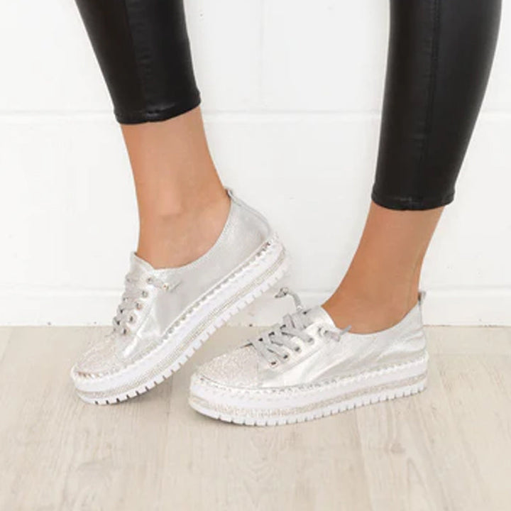 "Silvriga dam XO diamant sneakers med paljetter, glänsande design och EVA innersula för stil och komfort."