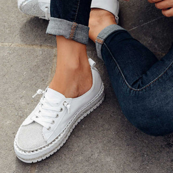 "Silvriga dam XO diamant sneakers med paljetter, glänsande design och EVA innersula för stil och komfort."