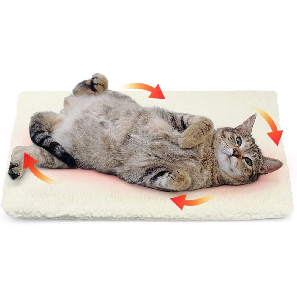 Mjuk självuppvärmande värmedyna. Perfekt sovplats som håller katt och hund varma och bekväma.
