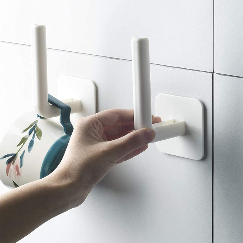 "Självhäftande vit krok i modern design, robust nog att hålla 6,8 kg. Perfekt för kök & badrum, enkel installation."