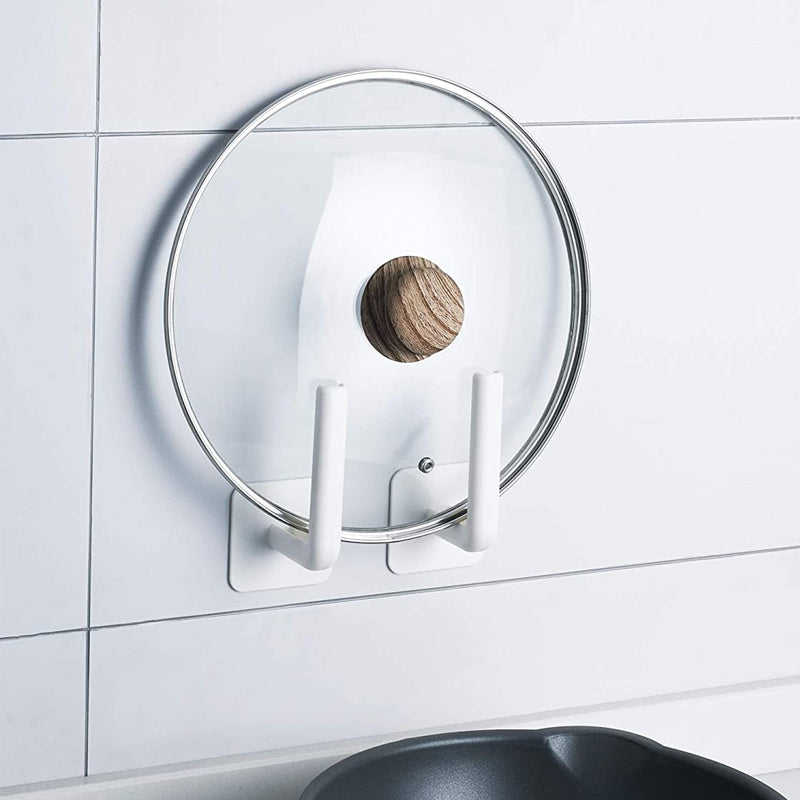 "Självhäftande vit krok i modern design, robust nog att hålla 6,8 kg. Perfekt för kök & badrum, enkel installation."