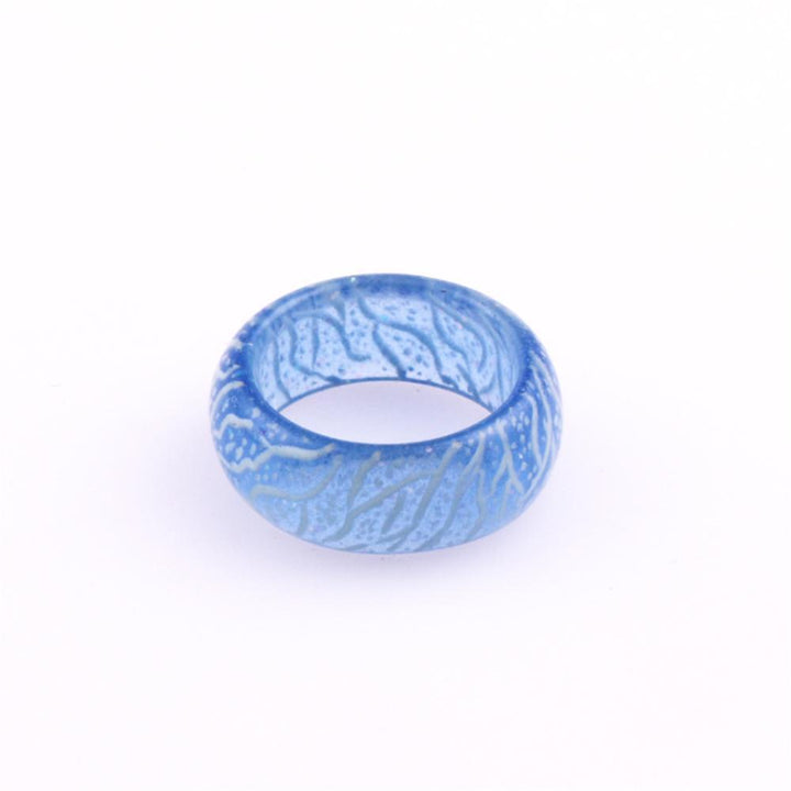 "Självlysande färgglad ring i harts med unik design, lyser i mörkret, perfekt accessoar för kvinnor vid fester och evenemang.