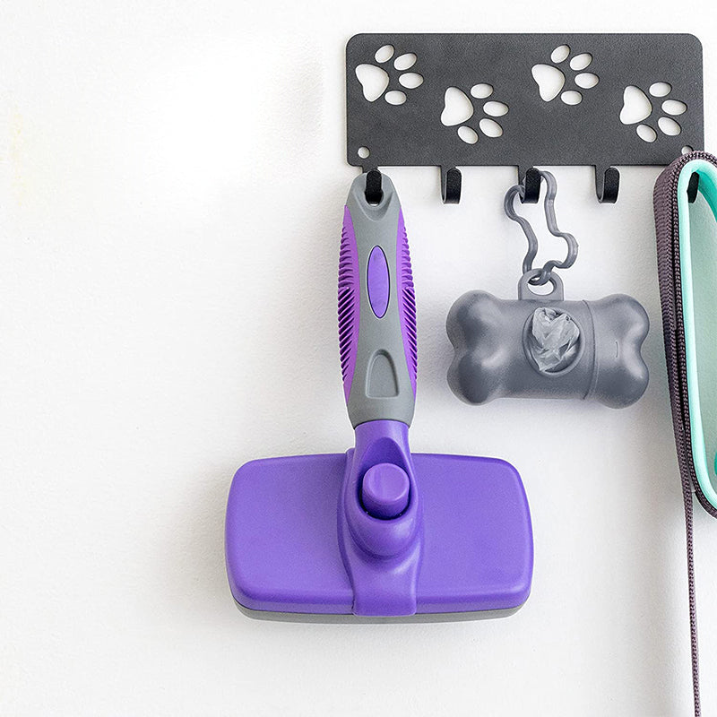 "Självrengörande djurborste för hundar och katter, ergonomisk design med gult handtag, enkel för pälsvård."