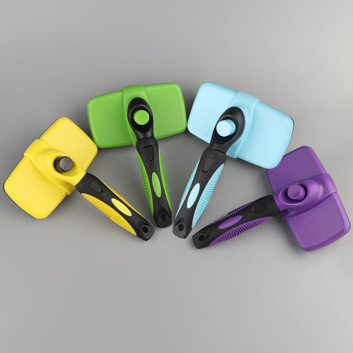 "Självrengörande djurborste för hundar och katter, ergonomisk design med gult handtag, enkel för pälsvård."