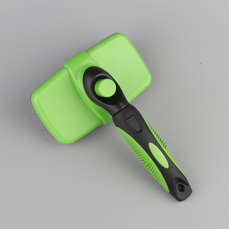 "Självrengörande djurborste för hundar och katter, ergonomisk design med gult handtag, enkel för pälsvård."