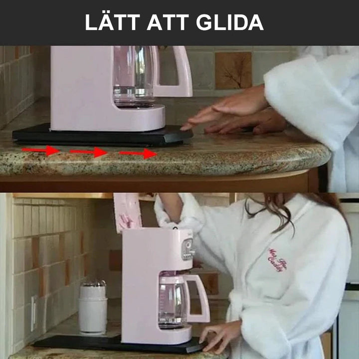 "Skjutbar svart kaffemaskinsbricka av ABS, elegant och robust, för köksapparater som kaffemaskiner och mixers."