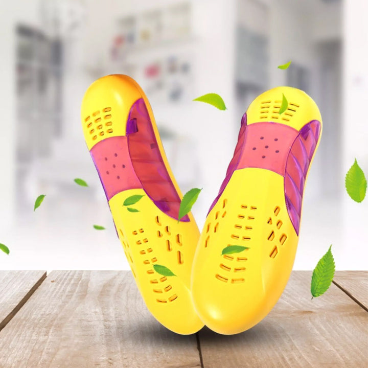 "Skotork med violett ljus, gul plast, kompakt form för effektiv torkning och hygien av skor och handskar."