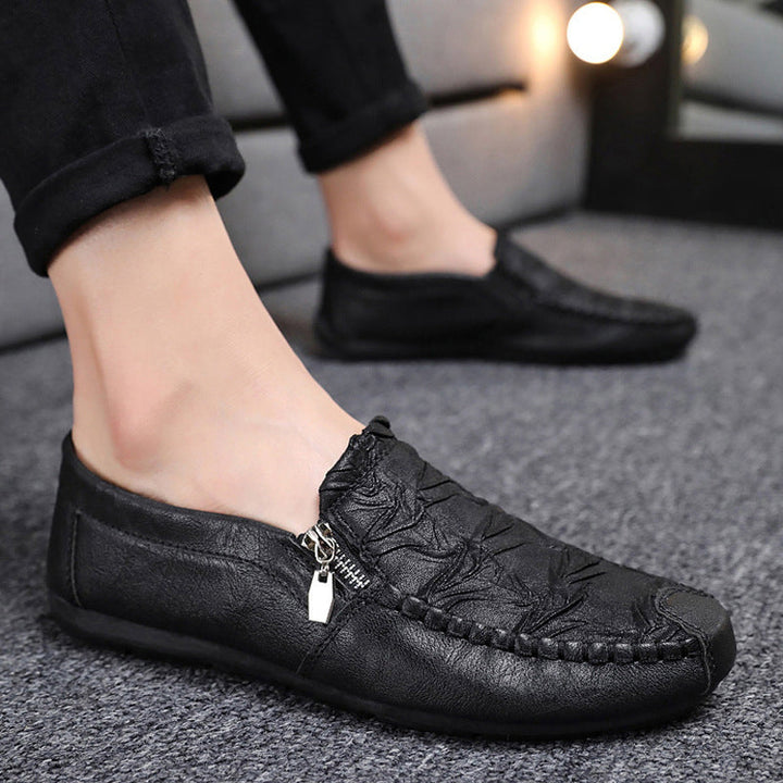 "Skrynkliga herrläderskor i PU-läder med mjuk gummisula, svart och brun färg, elegant casual design för män."