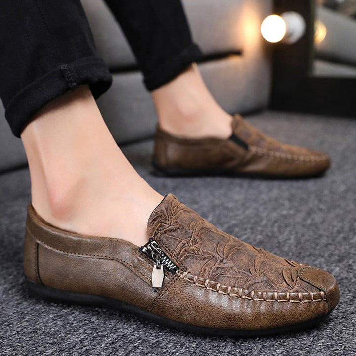 "Skrynkliga herrläderskor i PU-läder med mjuk gummisula, svart och brun färg, elegant casual design för män."
