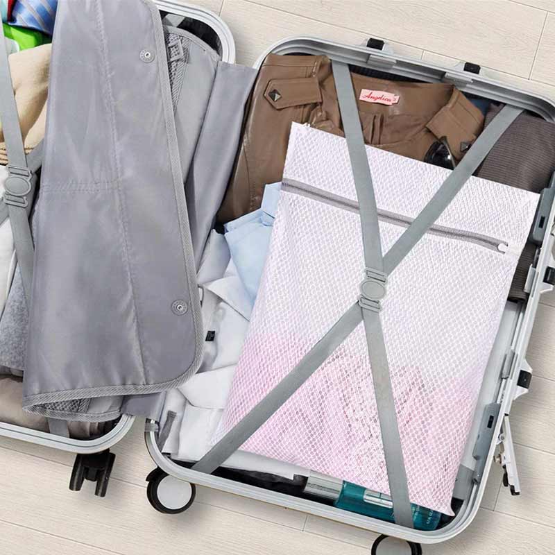 "Skyddsnätsväska för tvätt i vit polyester, slitstarkt nät för att skydda kläder från trassel och slitage under tvätt."