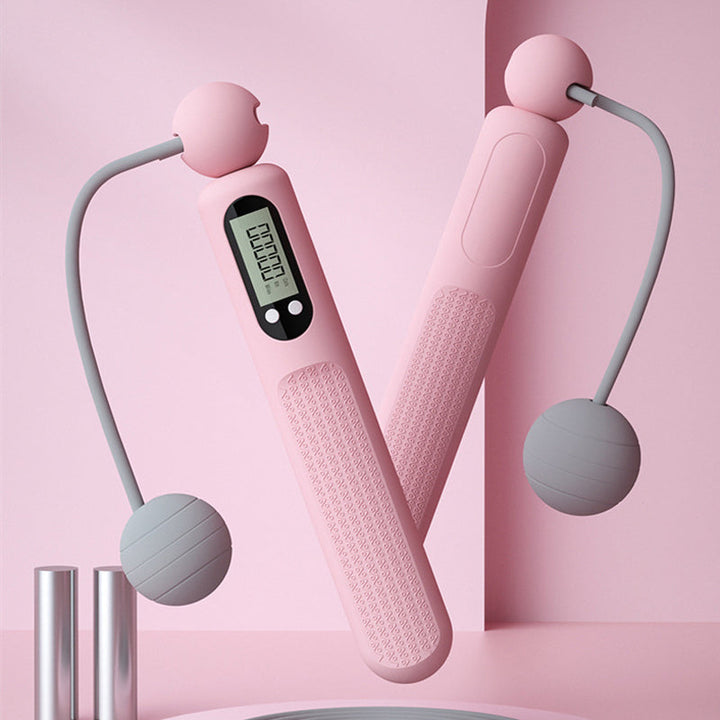 "Sladdlöst digitalt hopprep med avancerad LCD-skärm, trendiga färger rosa och blå, perfekt för smidig träning."