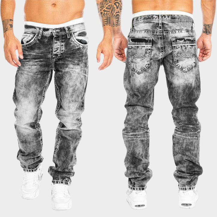 Herrjeans i slim fit modell av stretchig denim, trendig urban stil för moderna män.