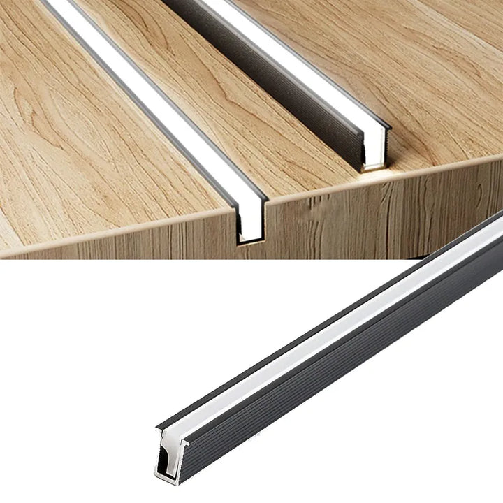 Slim LED-ljuslist för skåp, anpassbar längd och färgtemperatur, idealisk bänkbelysning.