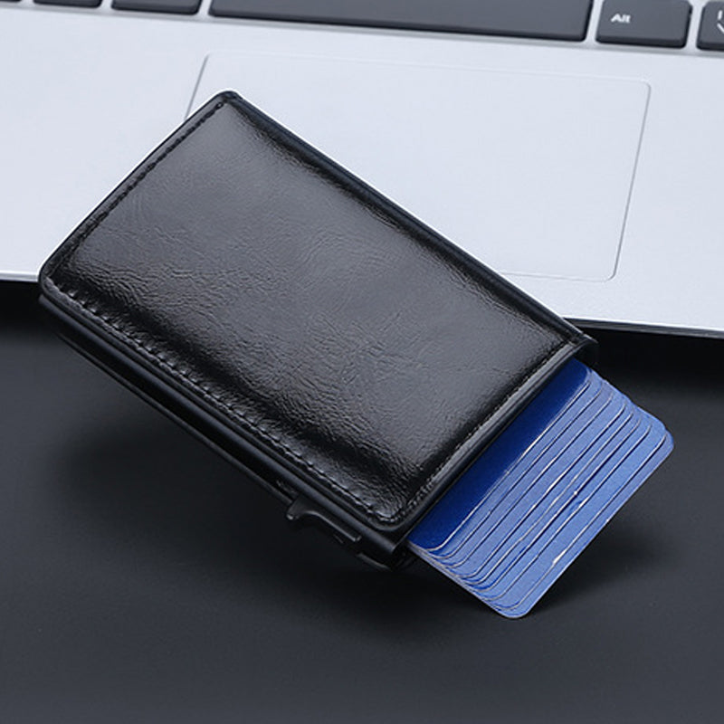 "Slimmad RFID-plånbok i aluminium för män, svart, minimalistisk design med kortplatser och ID-fönster, säker och stilren."