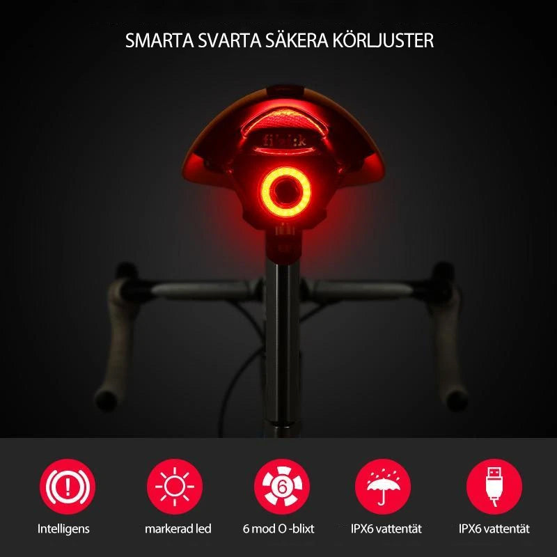"Smart cykel bakljus med USB-laddning och bromsljus, kompakt design, aluminium, LED, säkerhet för cykling i mörker."