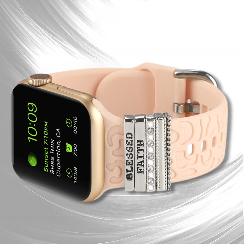 "Smartklockband med dekorativa metallringar i gyllene leopardmönster och roséguldstjärnor, elegant stilaccessoar."
