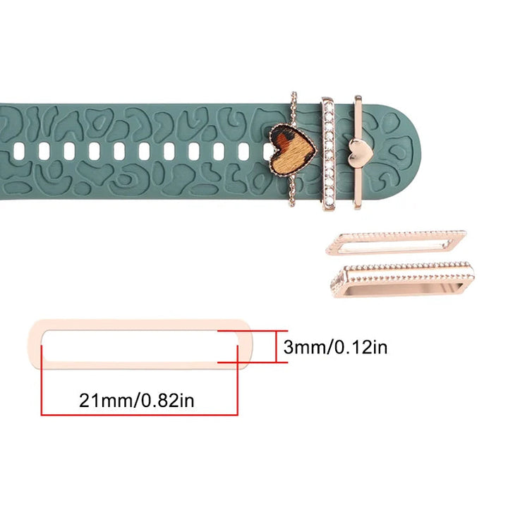 "Smartklockband med dekorativa metallringar i gyllene leopardmönster och roséguldstjärnor, elegant stilaccessoar."