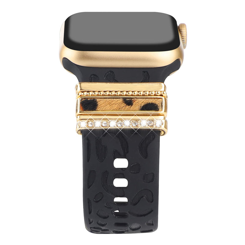 "Smartklockband med dekorativa metallringar i gyllene leopardmönster och roséguldstjärnor, elegant stilaccessoar."