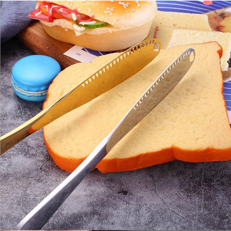 Smörkniv i rostfritt stål med ergonomisk design och 1-tums blad, finns i gyllene och silver. Perfekt för enkel smörspridning.