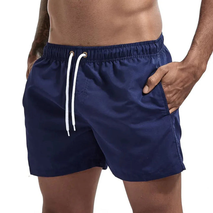 Nya svarta badshorts för män, snabbtorkande och stilrena, utmärkta för sommarens alla äventyr.