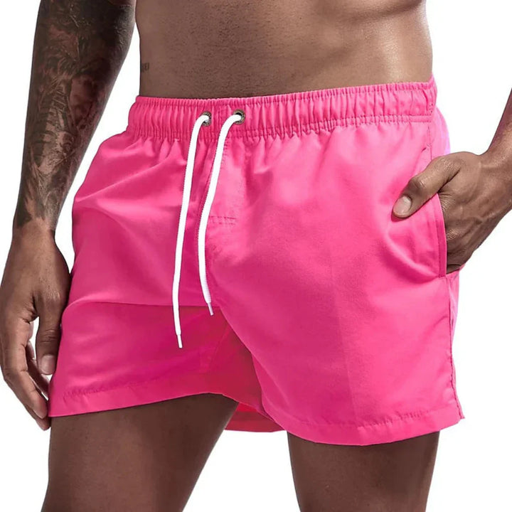 Snabbtorkande sportbadshorts för män, perfekta för simning, vattenlek och aktiva sommardagar.