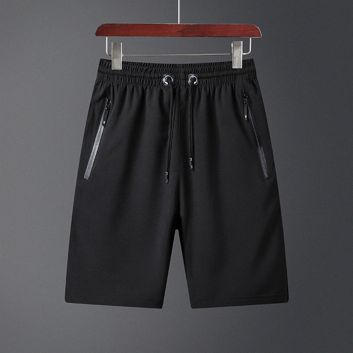 "Snabbtorkande herrshorts för stranden med sportlinjeformad design, fantastisk elasticitet och ventilerande material."