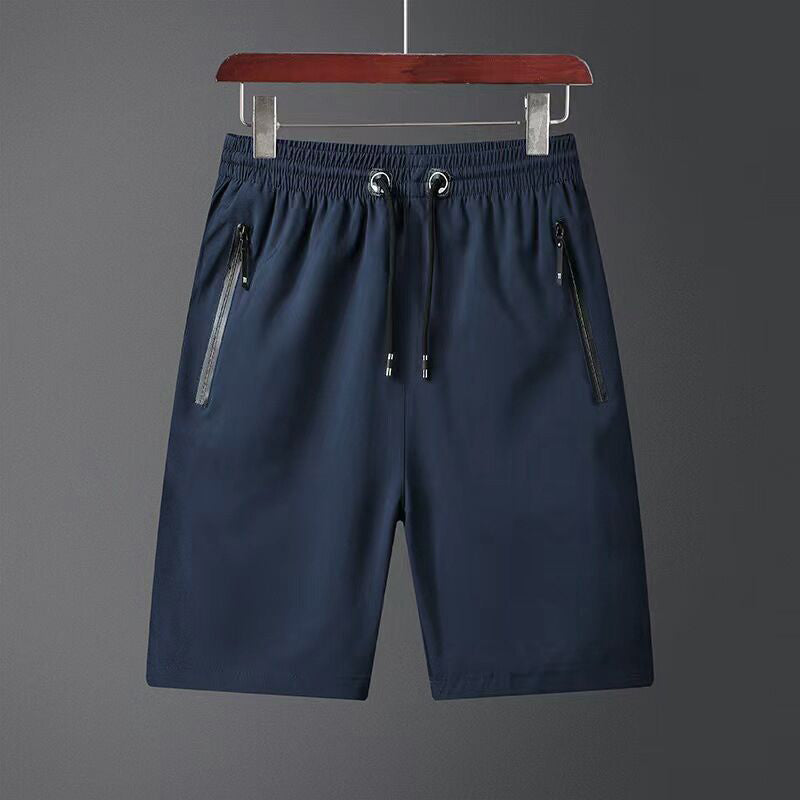 "Snabbtorkande herrshorts för stranden med sportlinjeformad design, fantastisk elasticitet och ventilerande material."