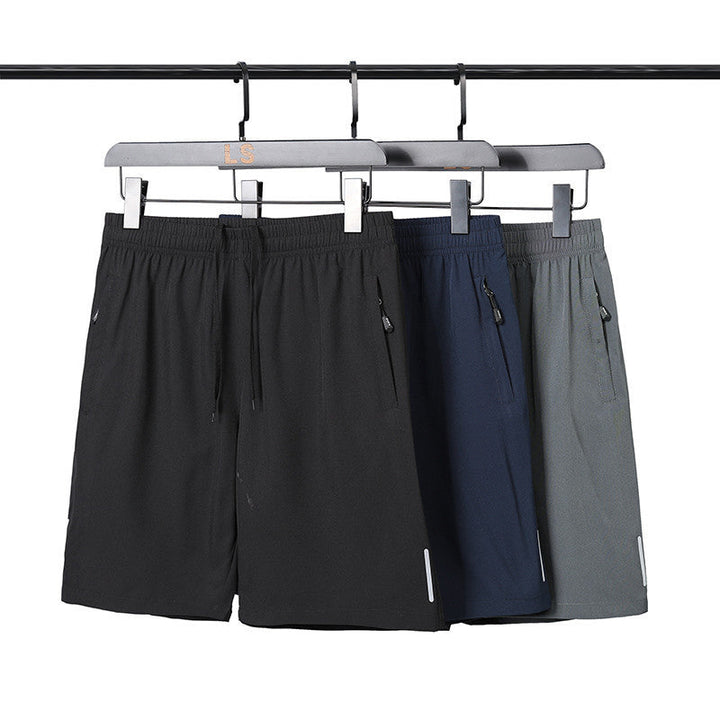 "Snabbtorkande herrshorts för stranden med sportlinjeformad design, fantastisk elasticitet och ventilerande material."