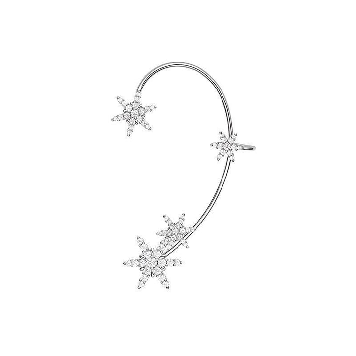 "Snöflinga örhängen för damer i gyllene och silver med justerbar storlek och gnistrande design inspirerad av natur."