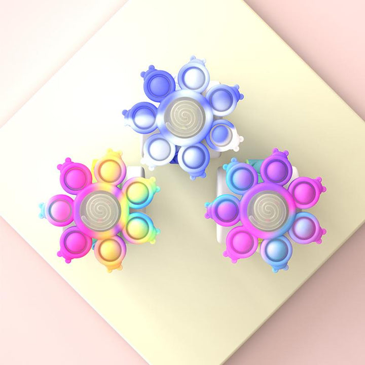 "Snurrande LED-poppande sensoriskt armband i silikon med ljus, perfekt för stil och stresslindring, färgglad och flexibel."