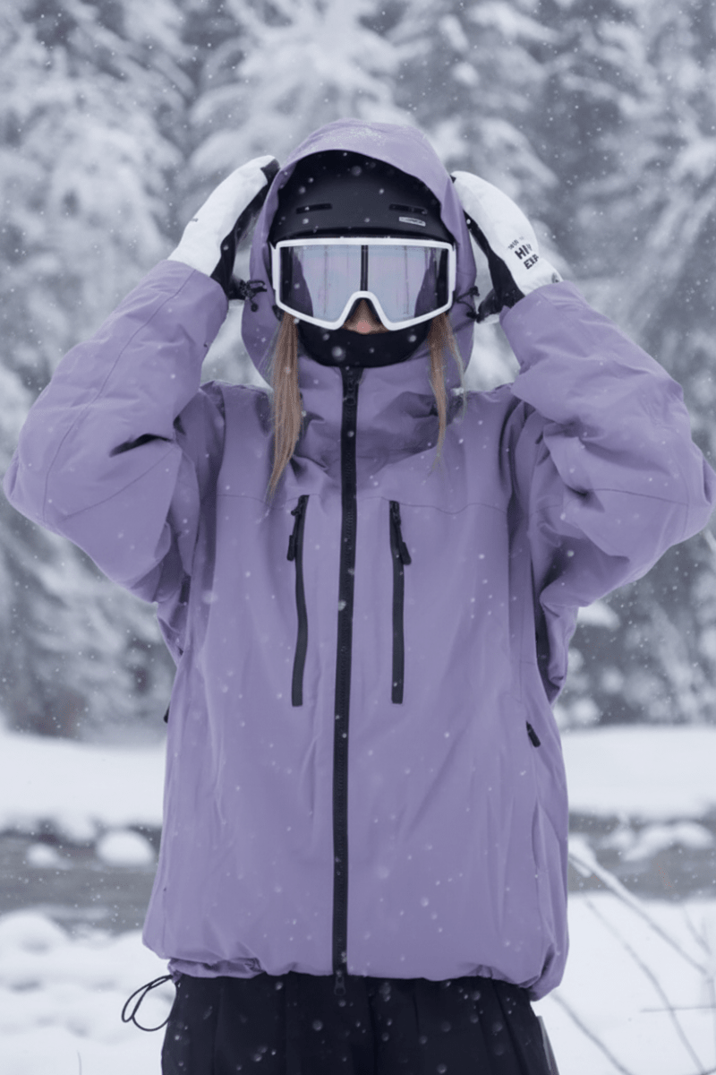 Varm och rörlig vinterjacka, modell Jesse, unisex. Slitstarkt ytterplagg i lila för skid- och snowboard.